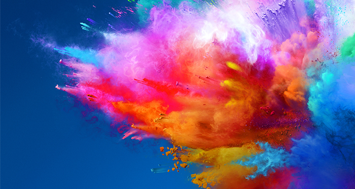 Colourful burst on blue background